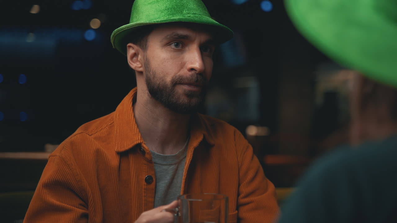Free stock video - Portrait of bearded man in irish hat talking with ...